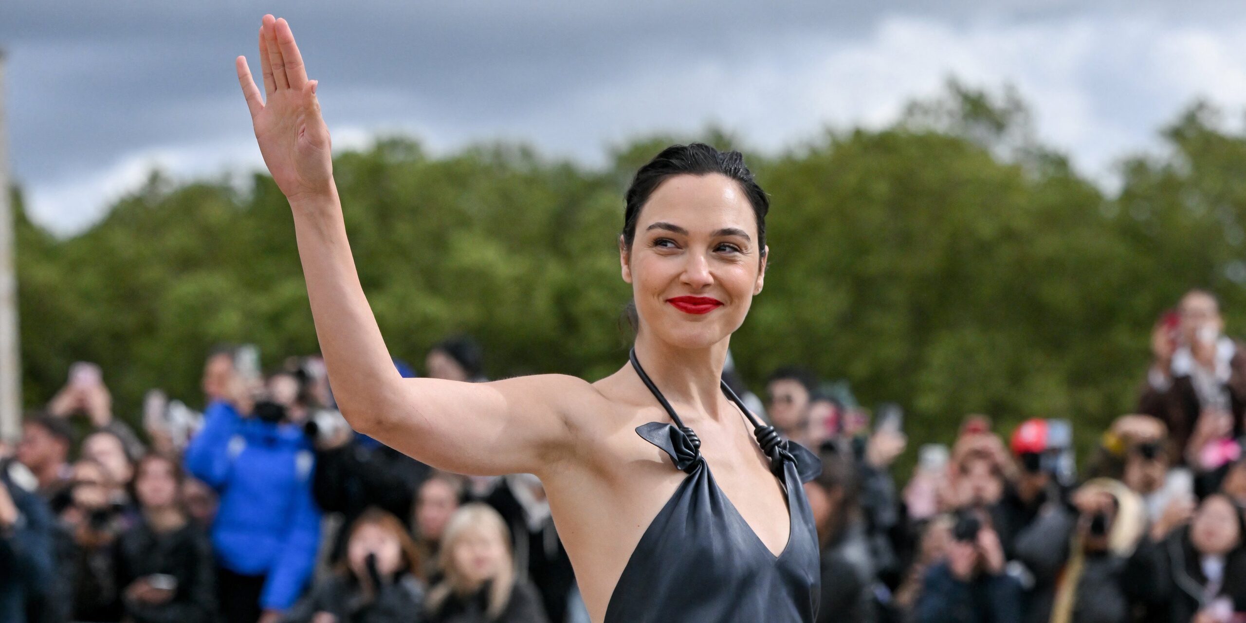 Gal Gadot looking happy as she waves on the red carpetVia: Abaca Press/INSTARimages