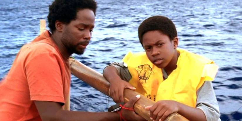 Harold Perrineau e Malcolm David Kelley como Michael e Walt em cena de Lost
